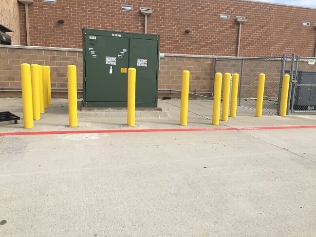 Parking lot bollards installed in your parking lot in Dripping Springs, Texas